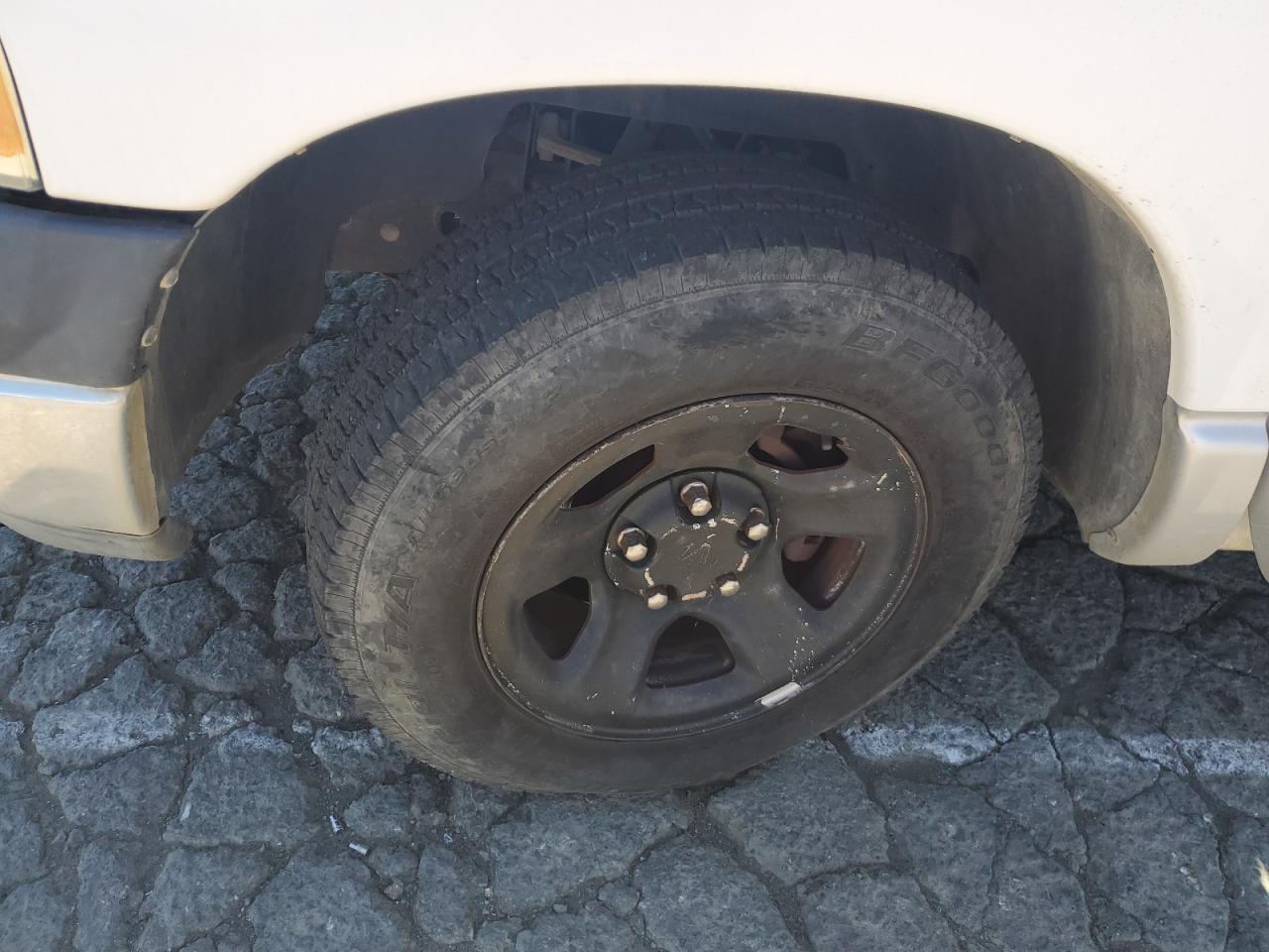 2003 Dodge Ram 1500 St White vin: 1D7HA16K23J512216 Damage: Left Front Wheel, Curb Rash, > 12 Inches