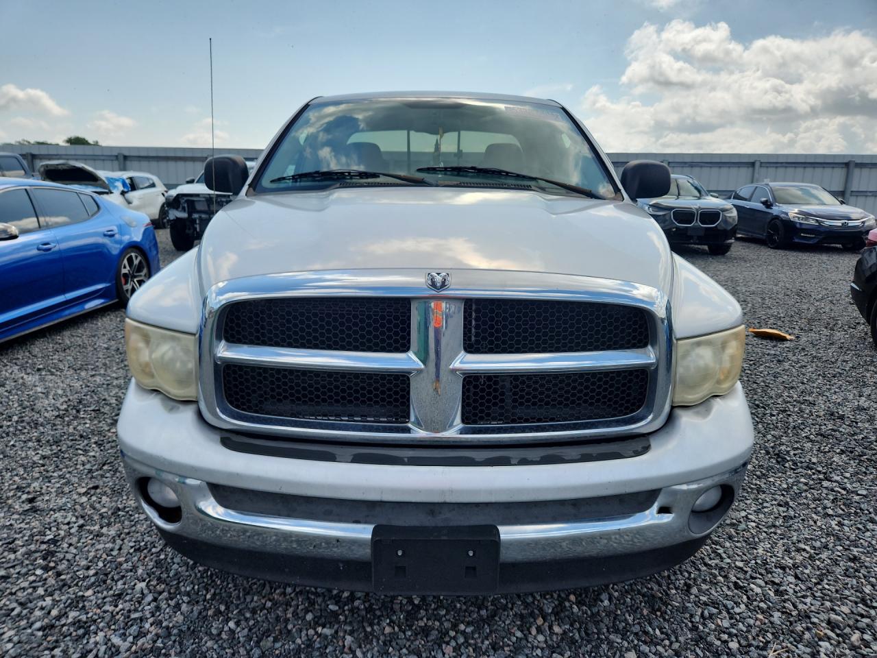 2005 Dodge Ram 1500 St Silver vin: 1D7HA18D15S121523 Damage: Left Head Lamp, Faded, Repair Required