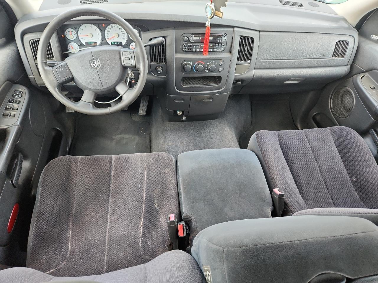 2005 Dodge Ram 1500 St Silver vin: 1D7HA18D15S121523 Damage: Left Front Seat, Torn, 1/2 To 1 Inch