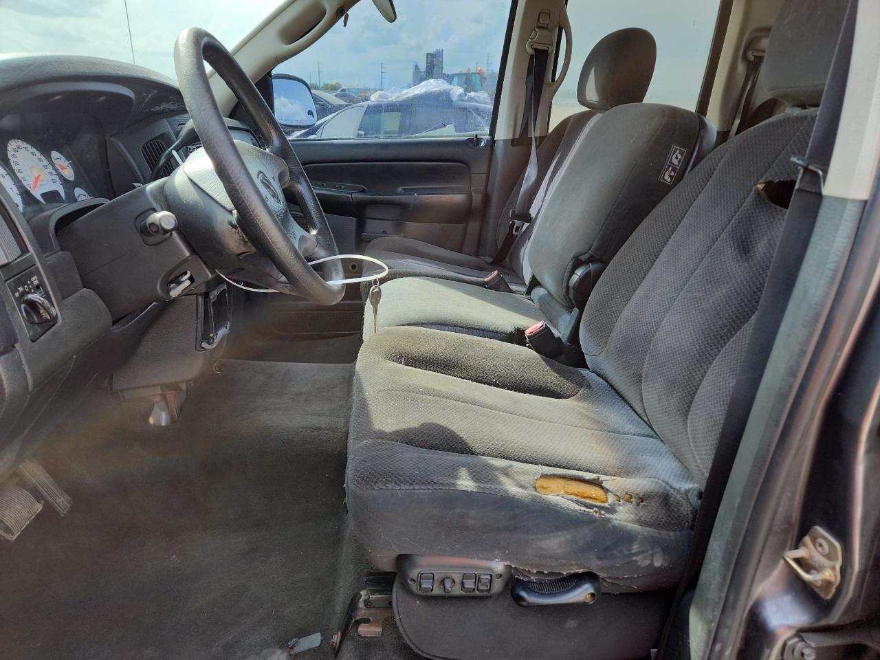 2003 Dodge Ram 1500 Gray vin: 1D7HA18N23S291332 Damage: Left Front Seat, Torn, > 12 Inches