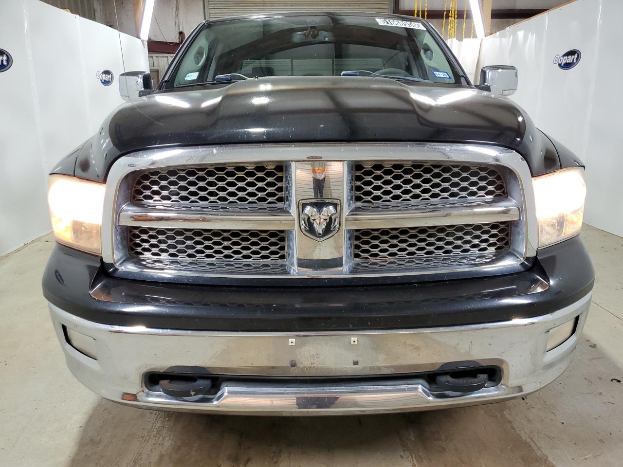 2010 Dodge Ram 1500 Black vin: 1D7RV1CT3AS159837 Damage: Left Head Lamp, Faded, Acceptable