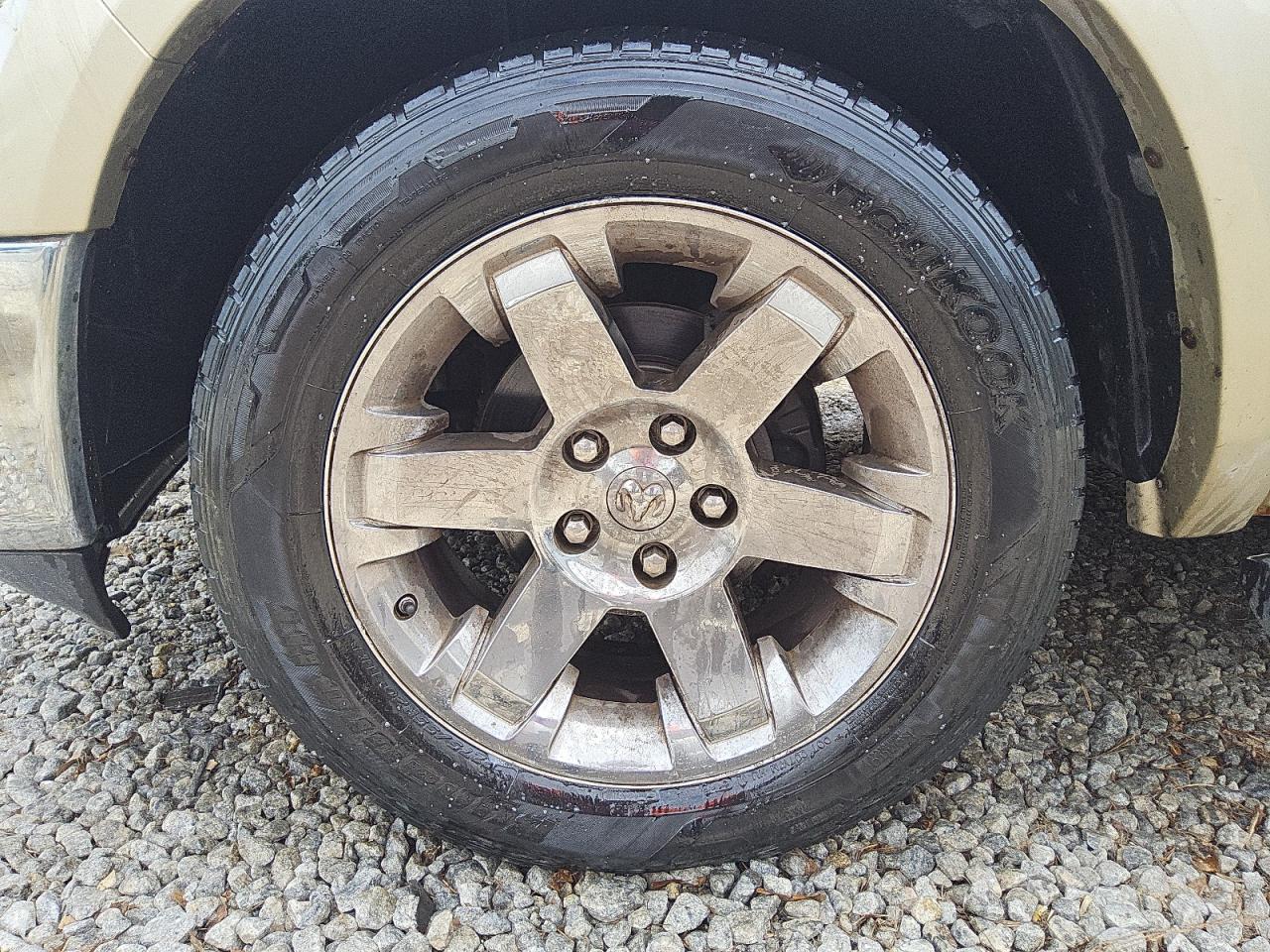 2011 Dodge Ram 1500 White vin: 1D7RV1GT0BS580281 Damage: Left Front Wheel, Curb Rash, > 12 Inches