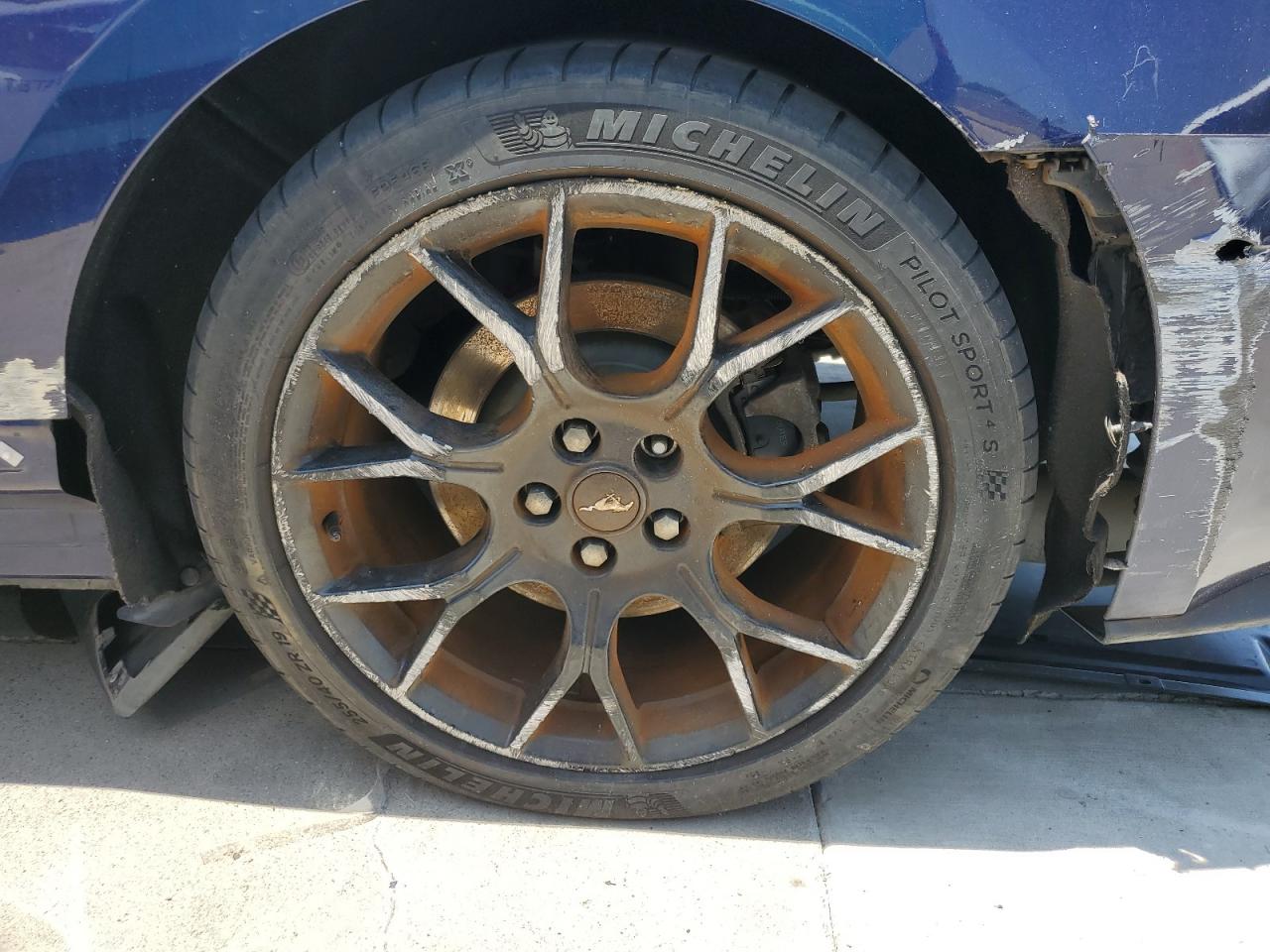 2018 Ford Mustang Blue vin: 1FA6P8TH2J5180372 Damage: Left Rear Wheel, Curb Rash, > 12 Inches