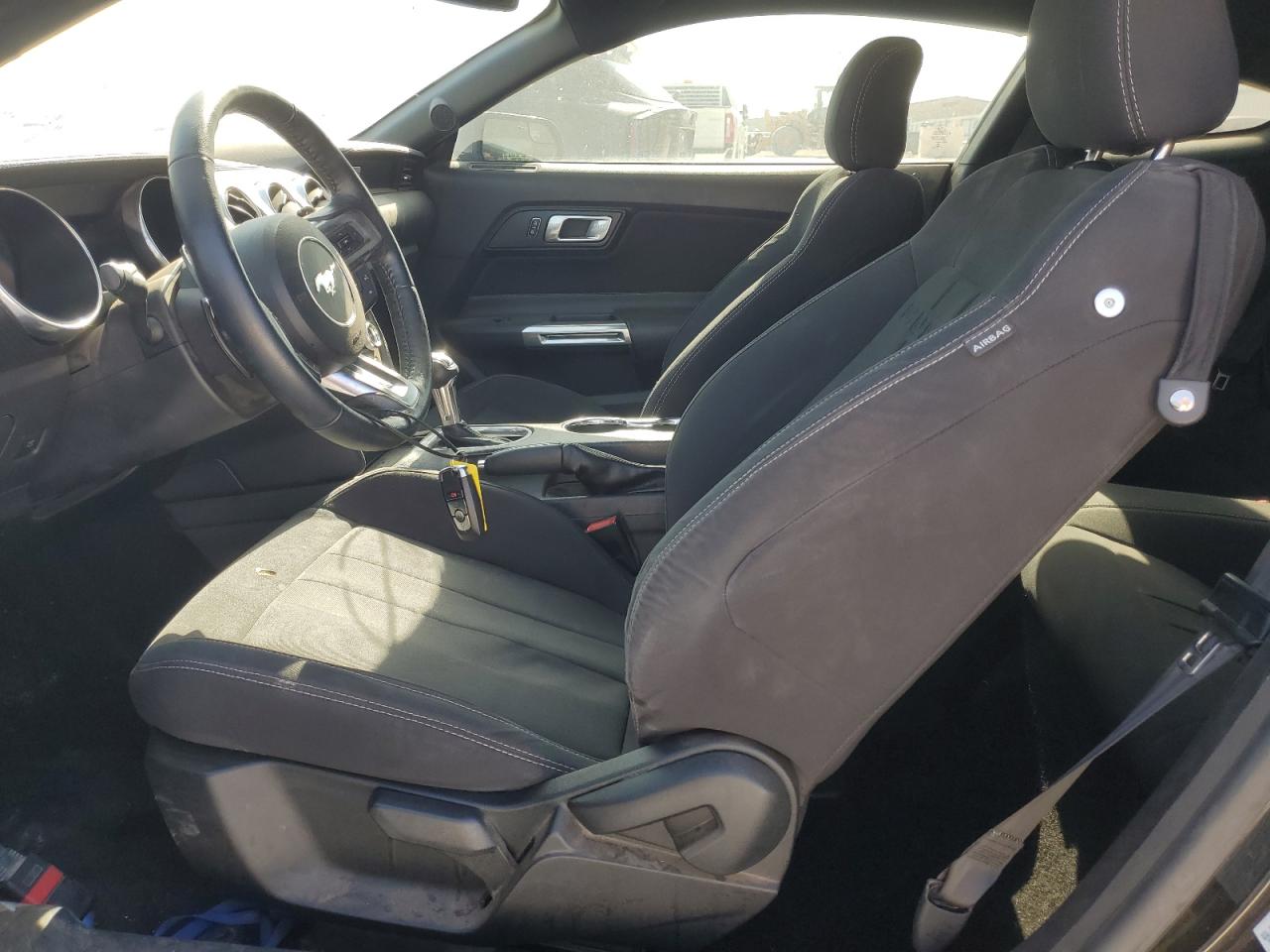 2019 Ford Mustang Black vin: 1FA6P8TH6K5152950 Damage: Left Front Seat Cushion, Torn, 1/2 To 1 Inch