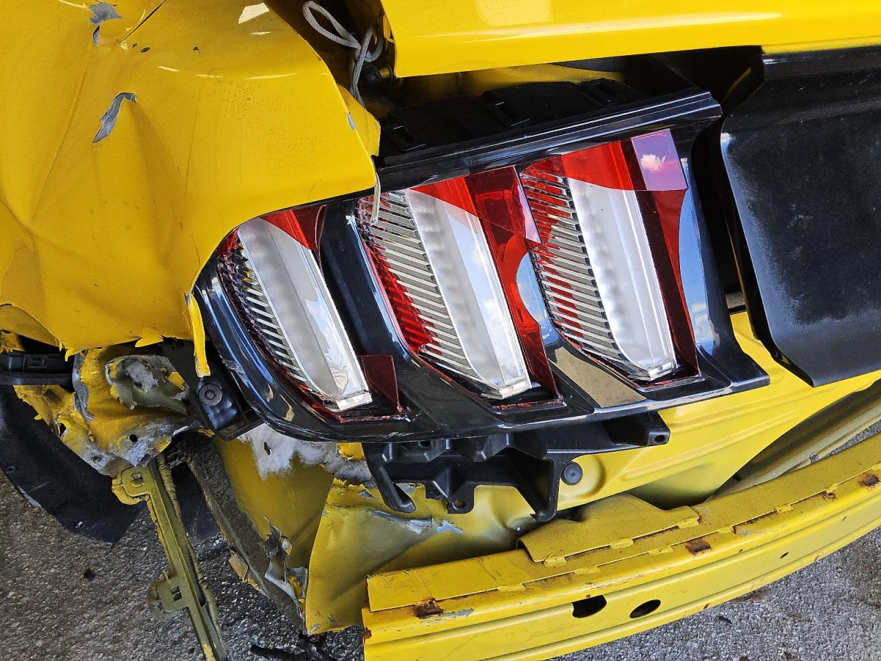 2015 Ford Mustang Yellow vin: 1FA6P8TH9F5380463 Damage: Left Tail Light, Broken, Replacement Required