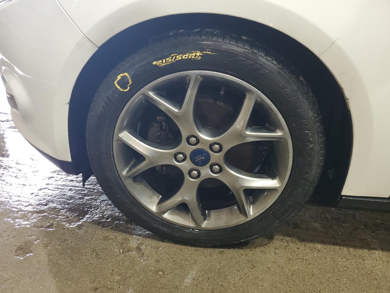 2014 Ford Focus Se White vin: 1FADP3F20EL234027 Damage: Left Front Tire, Worn, Replacement Required