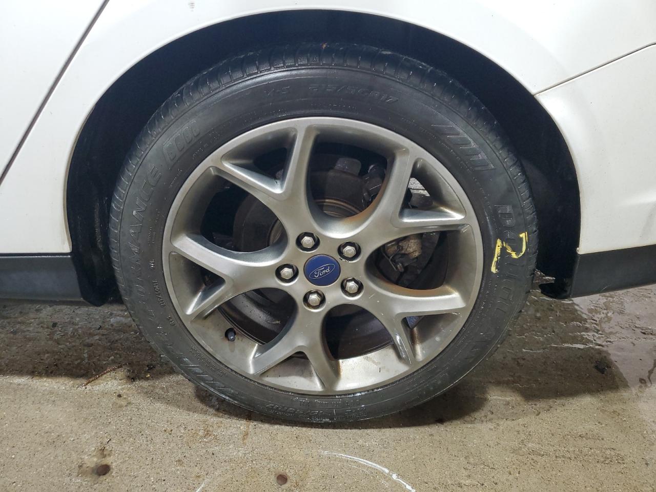 2014 Ford Focus Se White vin: 1FADP3F20EL234027 Damage: Left Rear Tire, Worn, Replacement Required