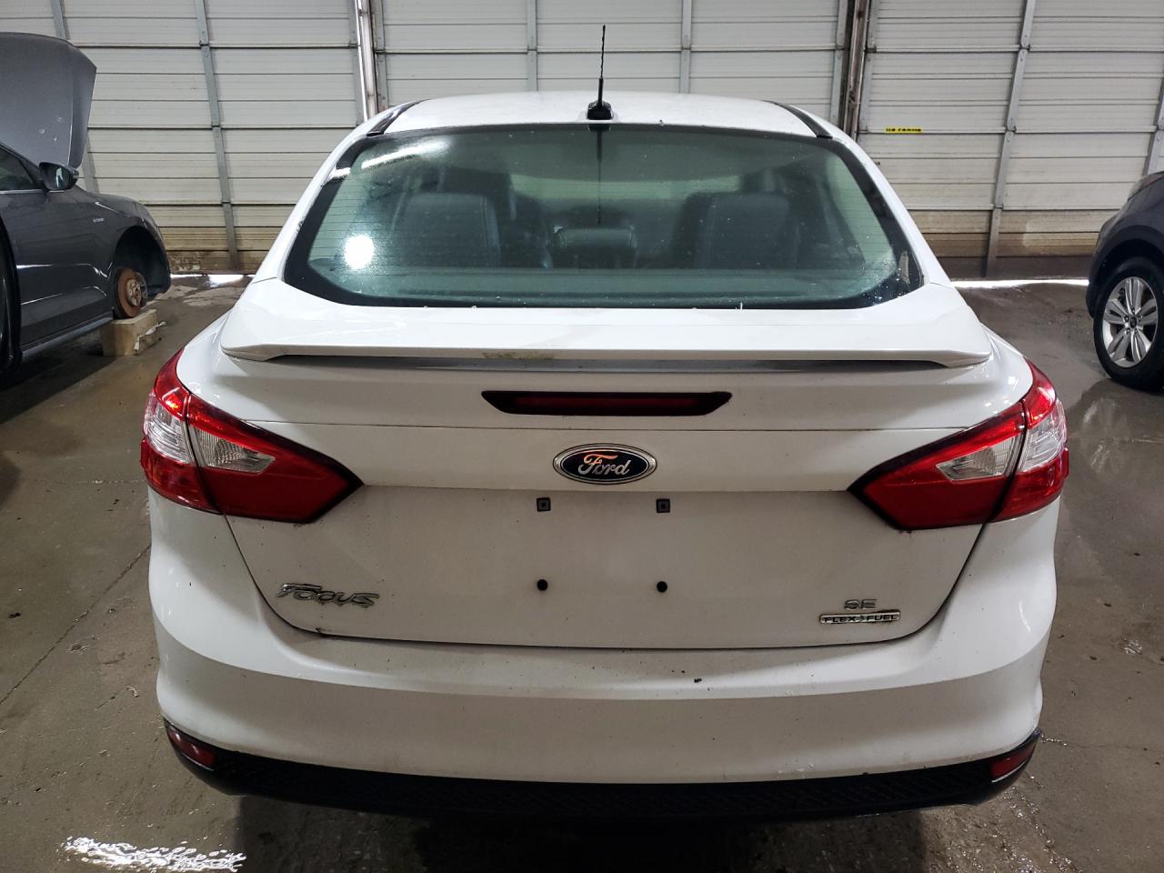 2014 Ford Focus Se White vin: 1FADP3F20EL234027 Damage: Rear Bumper, Multiple Scratches Heavy, 4