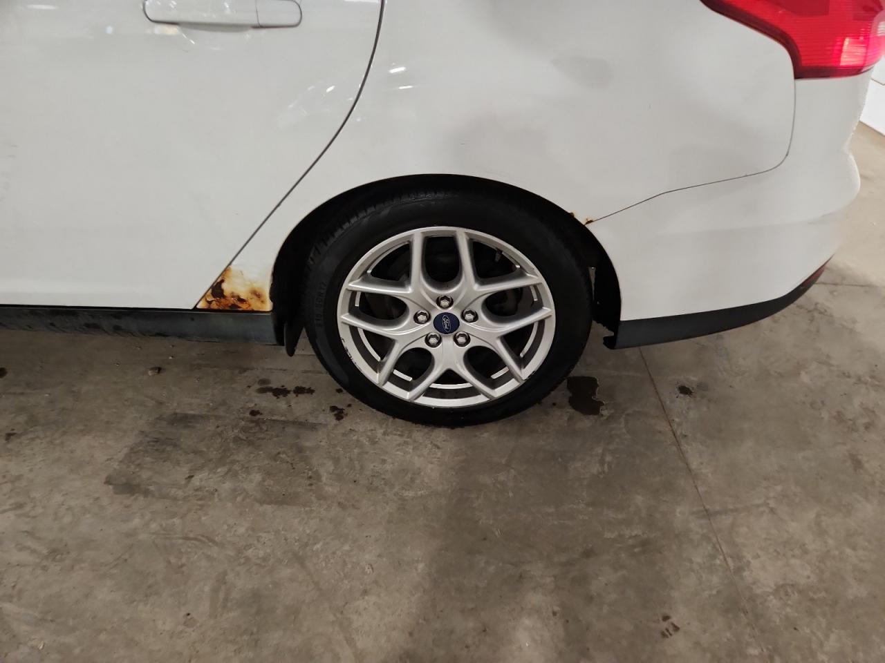 2015 Ford Focus Se White vin: 1FADP3F20FL245174 Damage: Left Qtr Panel, Corrosion, Severe Damage