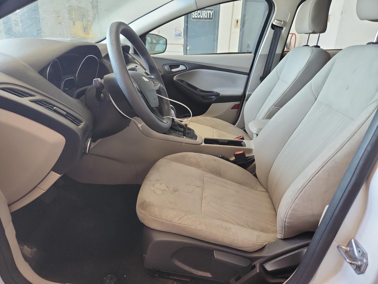 2015 Ford Focus Se White vin: 1FADP3F21FL328810 Damage: Left Front Seat, Stained, Permanent