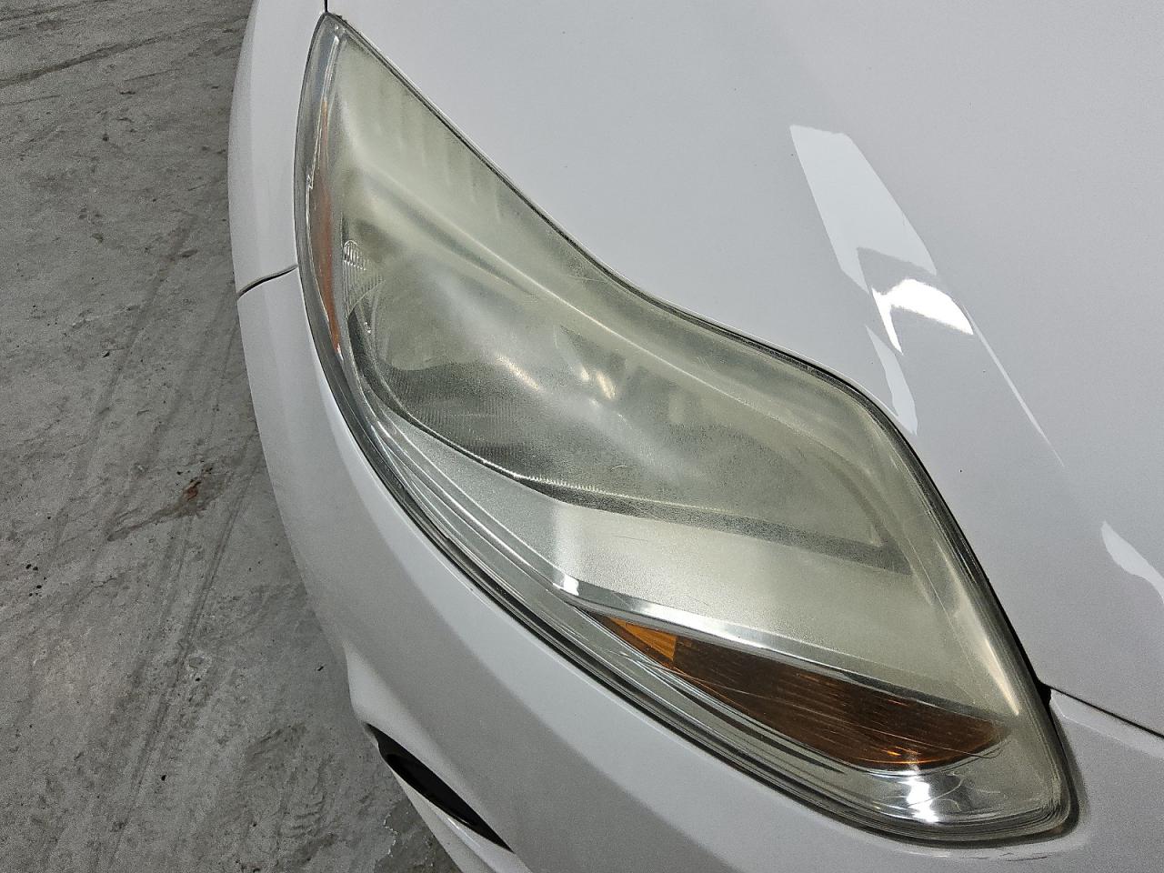 2014 Ford Focus Se White vin: 1FADP3F23EL446484 Damage: Right Head Lamp, Faded, Repair Required