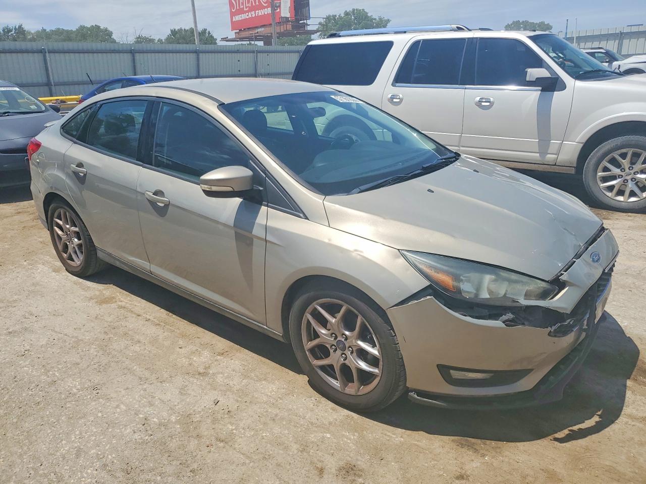 2015 Ford Focus Se Tan vin: 1FADP3F24FL255545