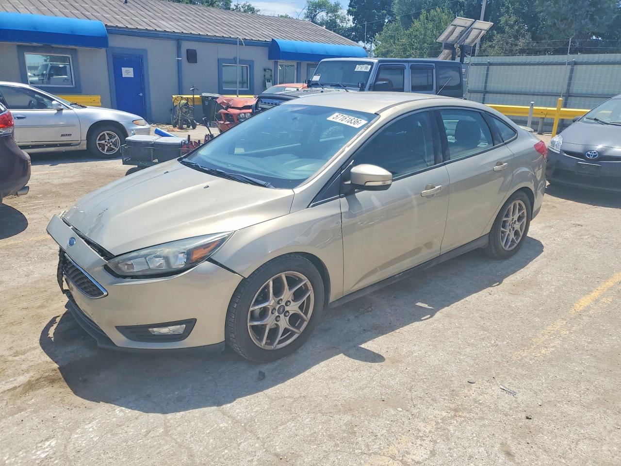 2015 Ford Focus Se Tan vin: 1FADP3F24FL255545