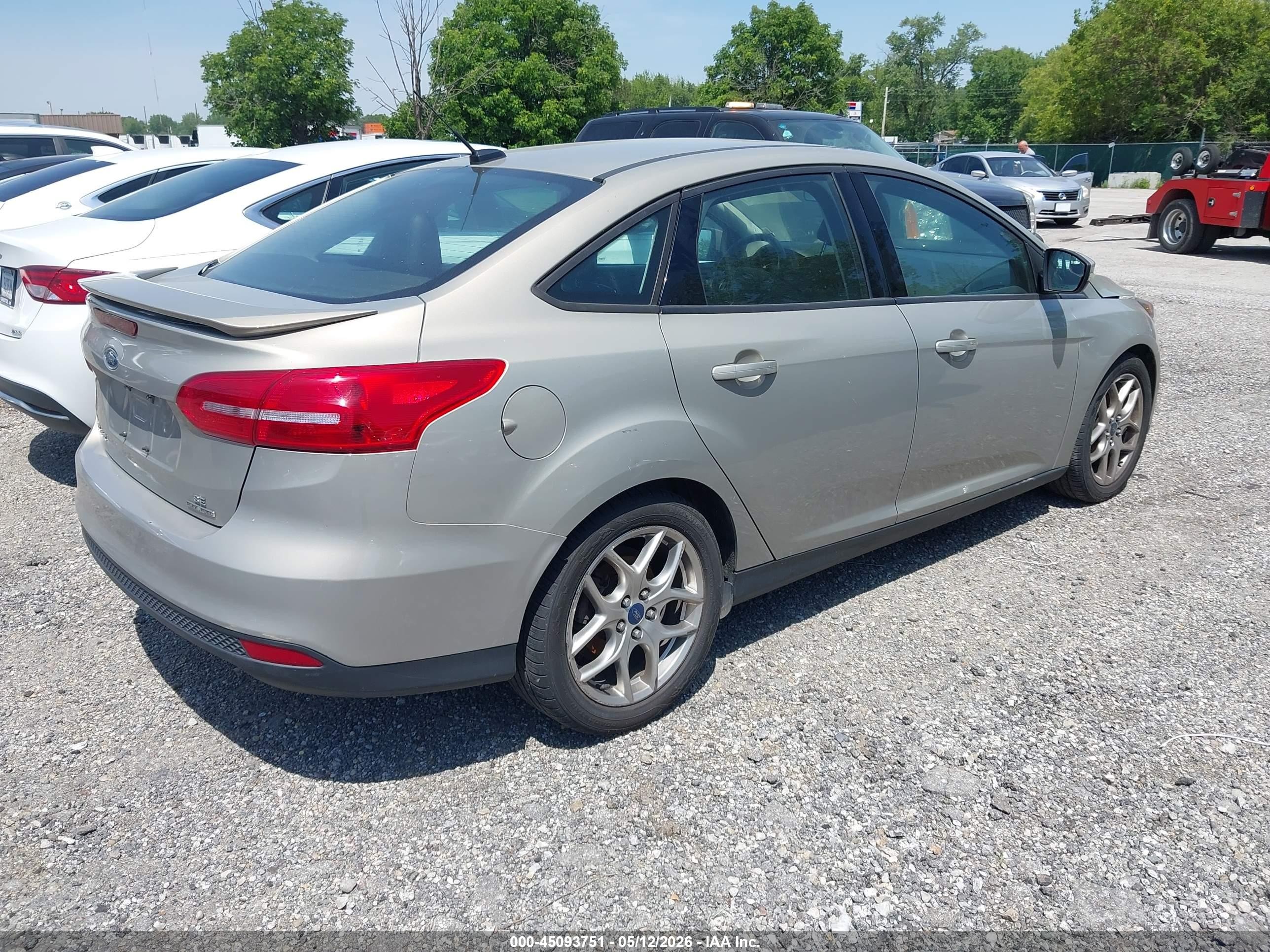 2015 Ford Focus Se Tan vin: 1FADP3F24FL302198