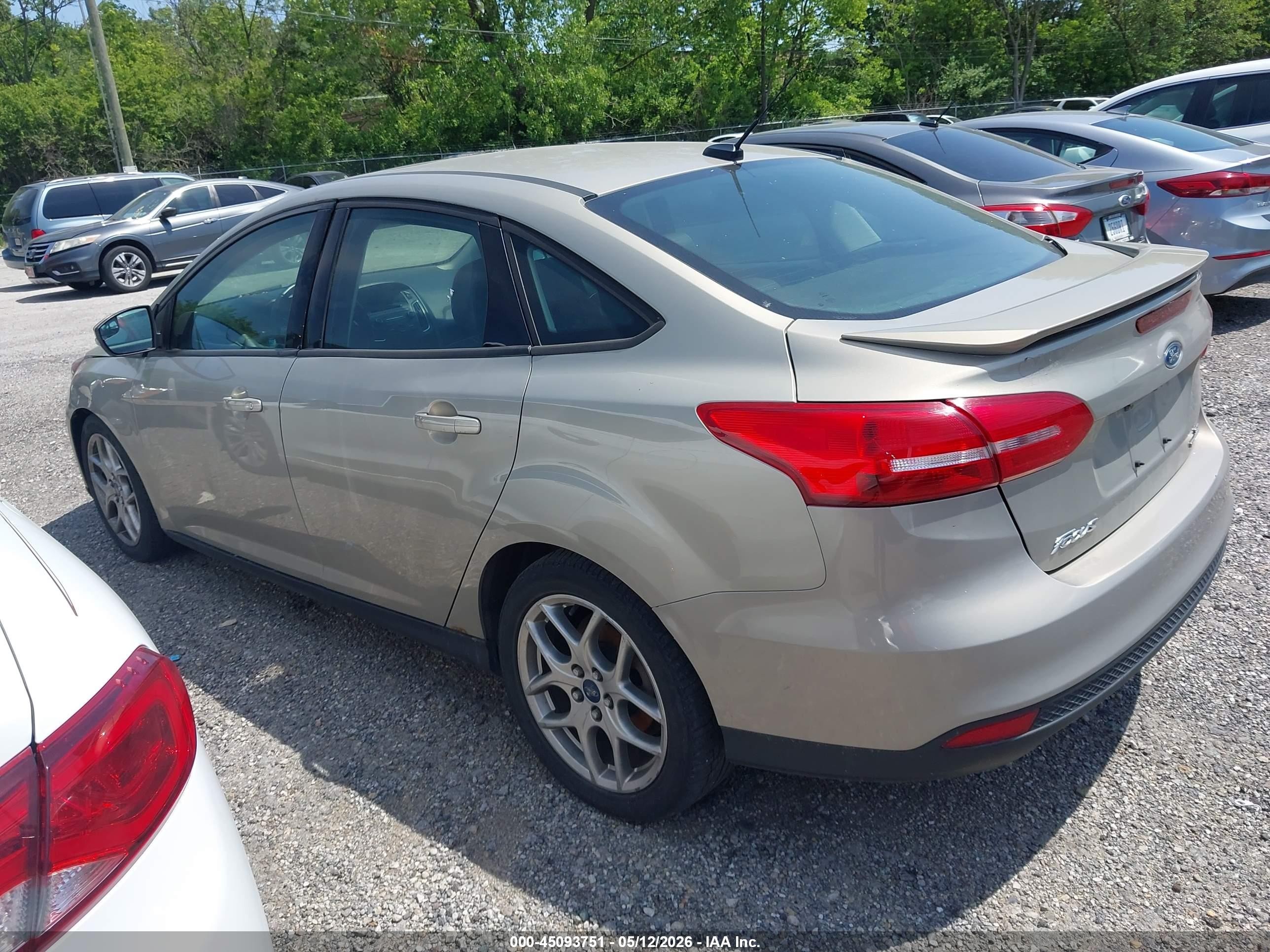 2015 Ford Focus Se Tan vin: 1FADP3F24FL302198