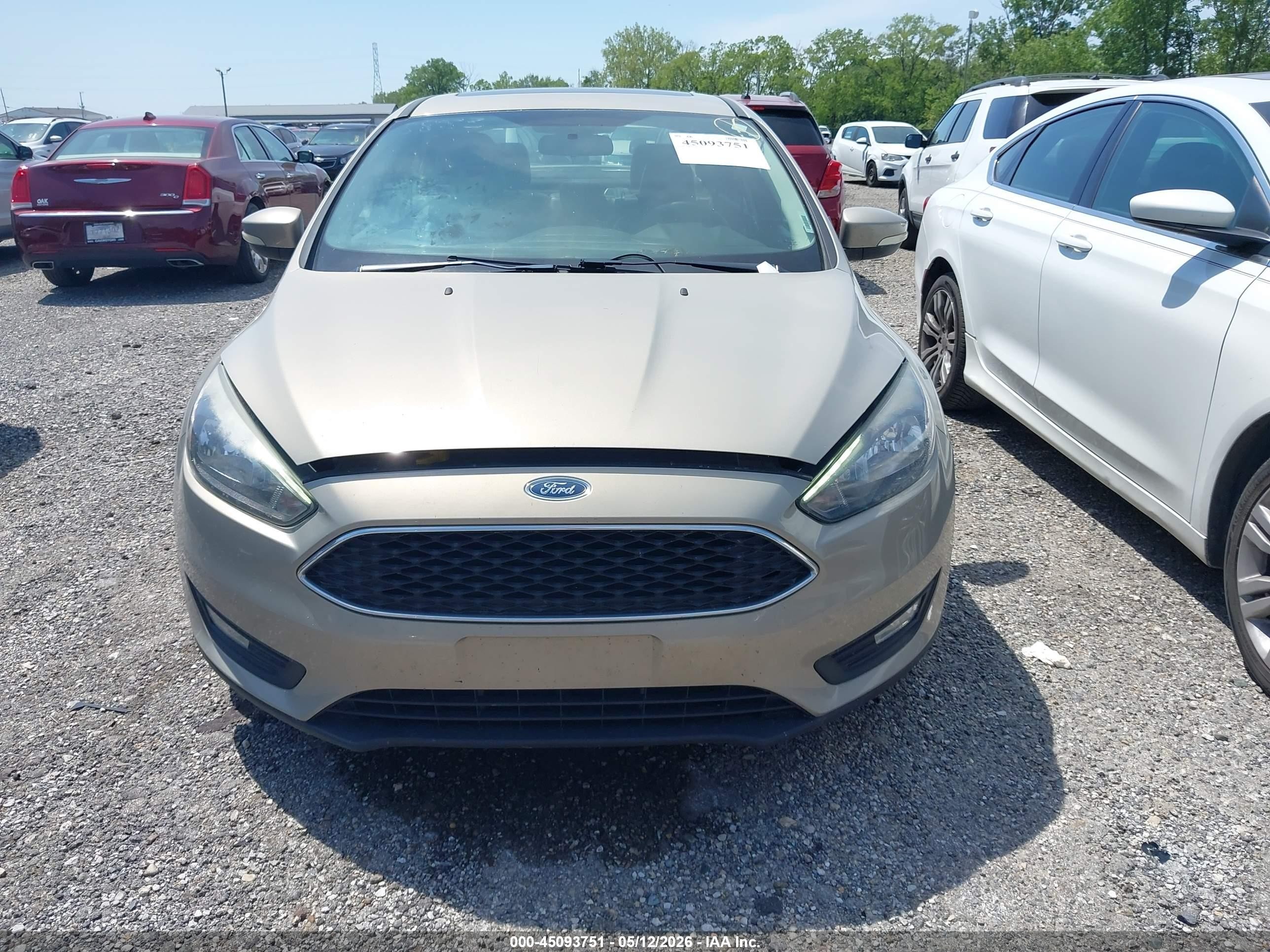 2015 Ford Focus Se Tan vin: 1FADP3F24FL302198
