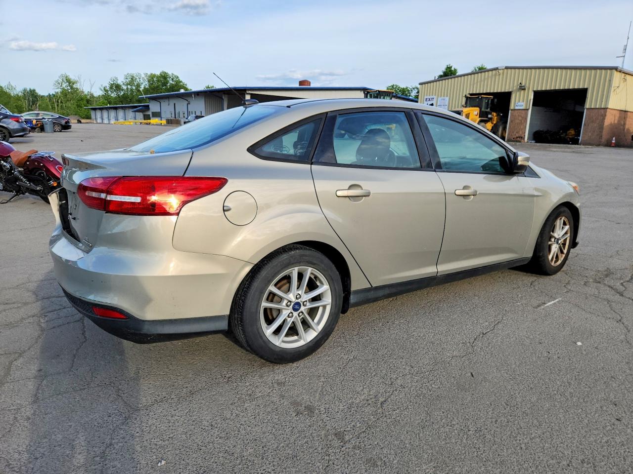 2015 Ford Focus Se Tan vin: 1FADP3F25FL228466