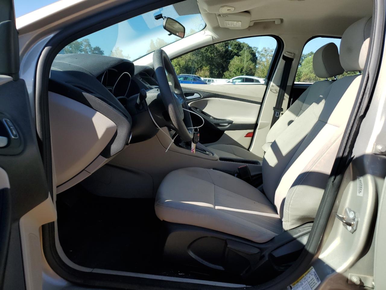 2015 Ford Focus Se Tan vin: 1FADP3F25FL259104