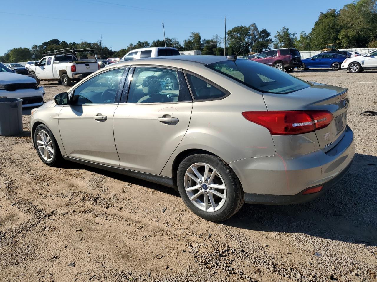 2015 Ford Focus Se Tan vin: 1FADP3F25FL259104