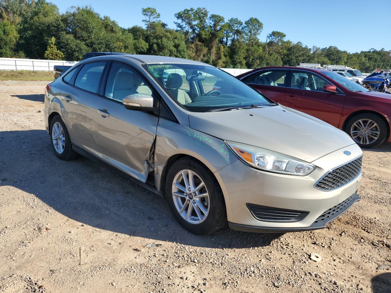 2015 Ford Focus Se Tan vin: 1FADP3F25FL259104