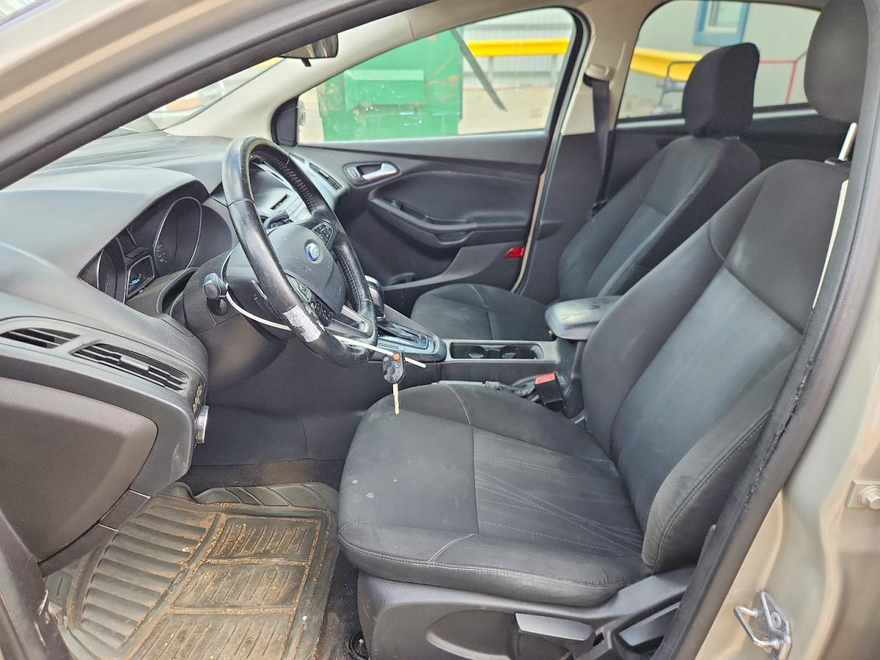 2015 Ford Focus Se Tan vin: 1FADP3F25FL323626