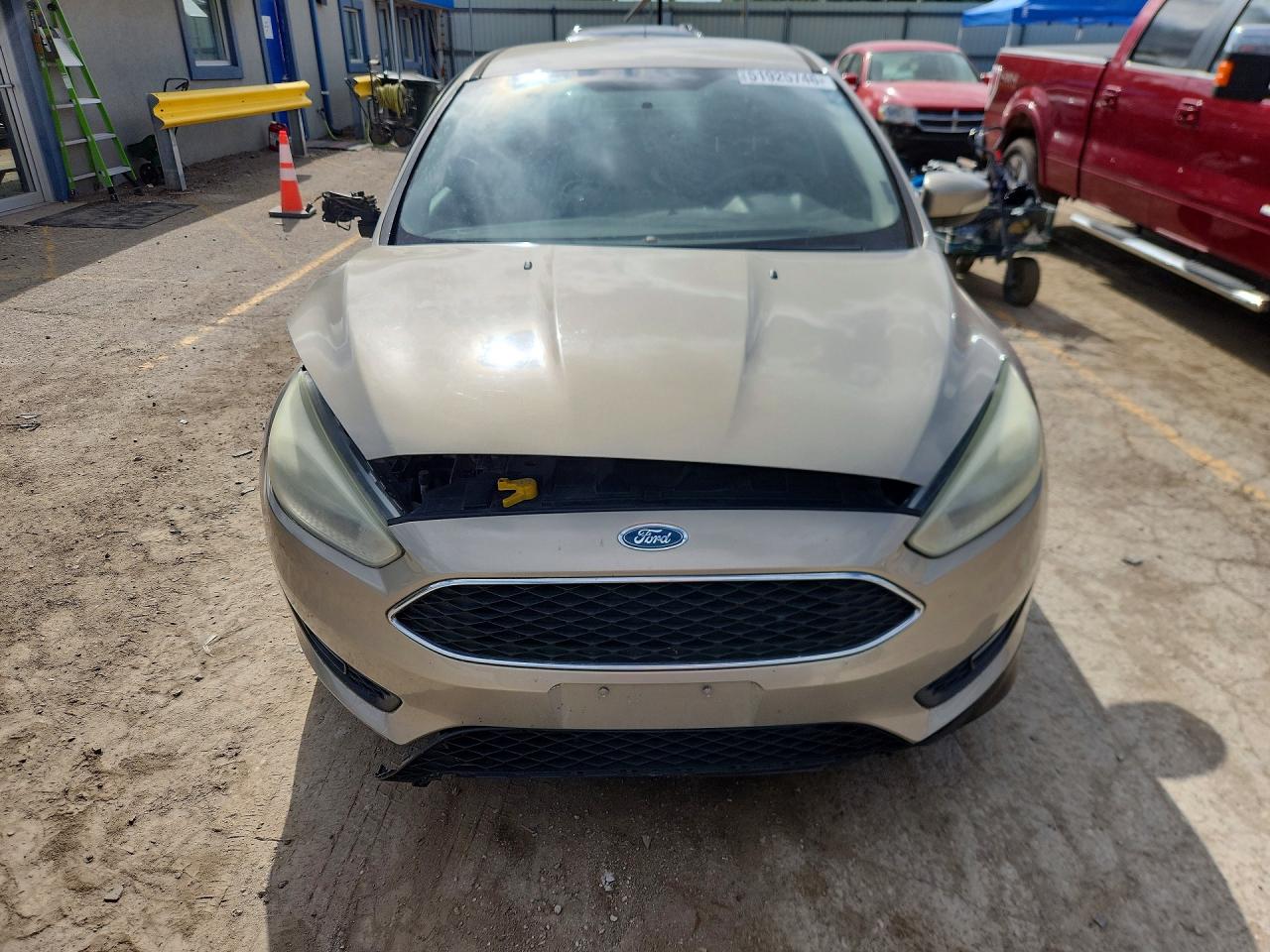 2015 Ford Focus Se Tan vin: 1FADP3F25FL323626