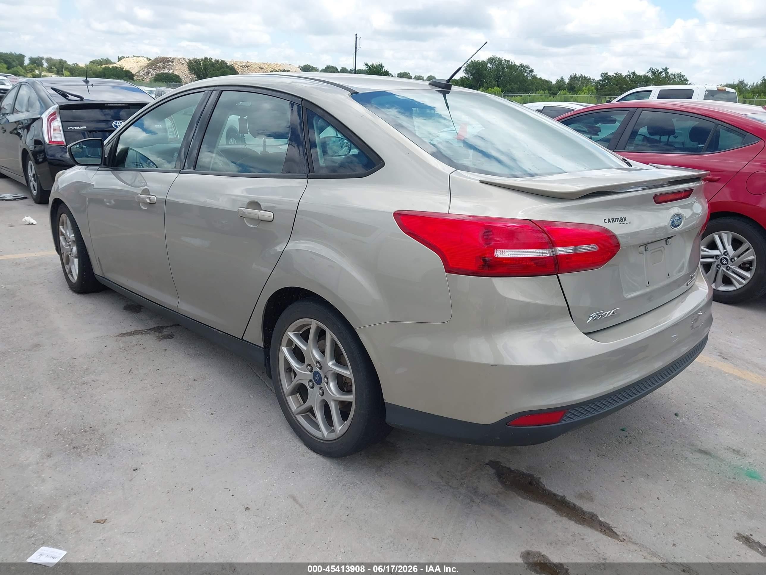 2015 Ford Focus Se Tan vin: 1FADP3F26FL296453
