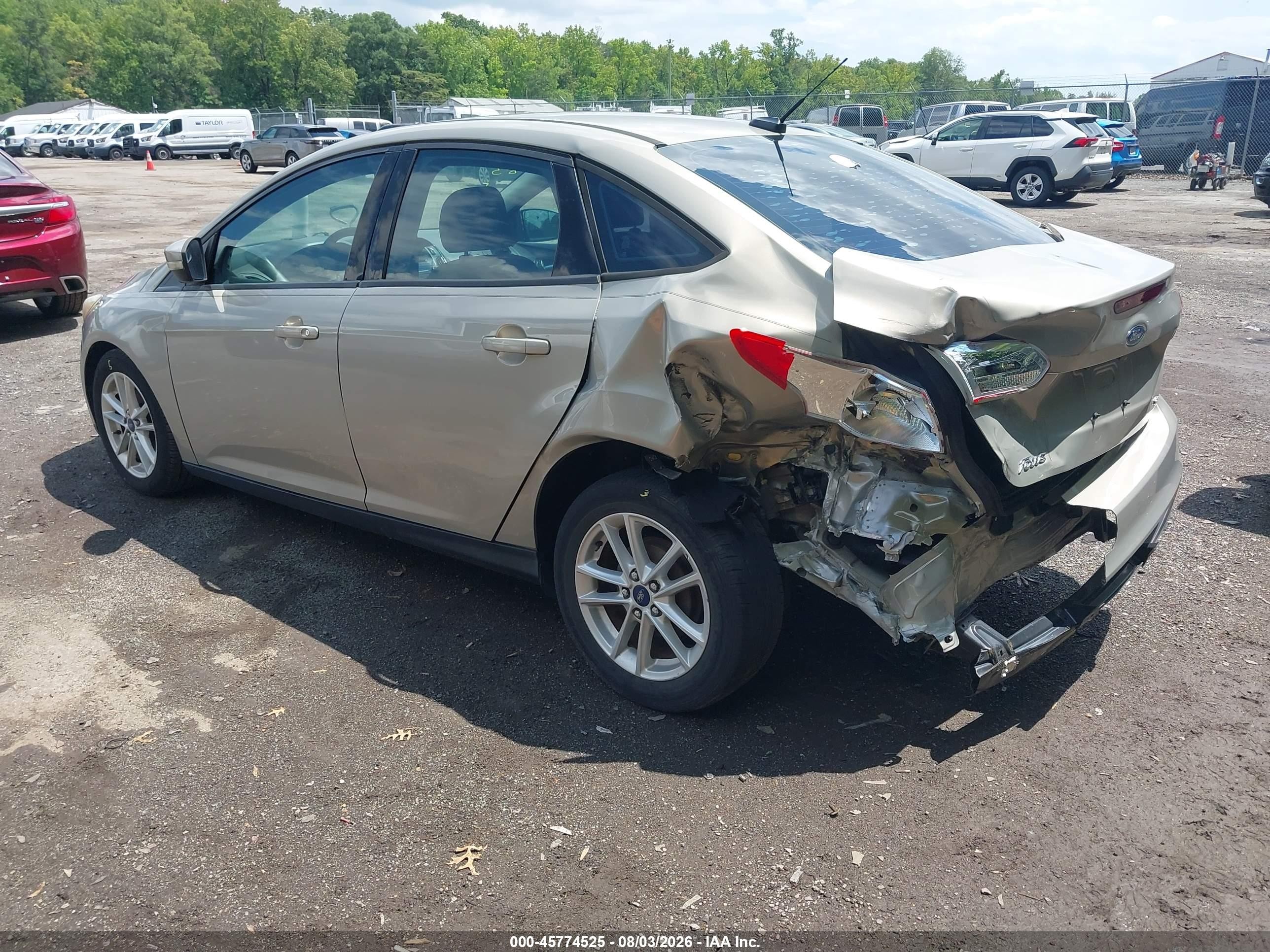 2015 Ford Focus Se Champagne vin: 1FADP3F27FL317049