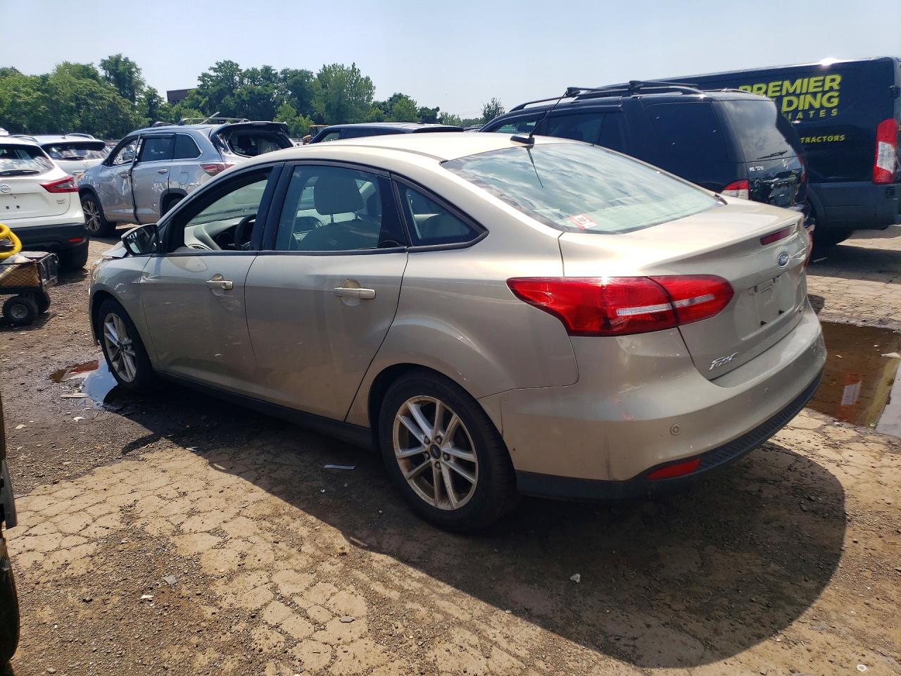 2015 Ford Focus Se Tan vin: 1FADP3F27FL377865