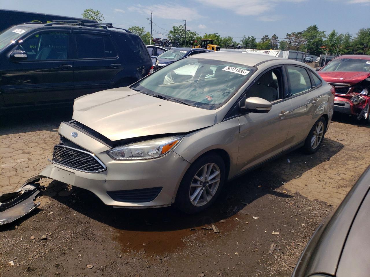 2015 Ford Focus Se Tan vin: 1FADP3F27FL377865