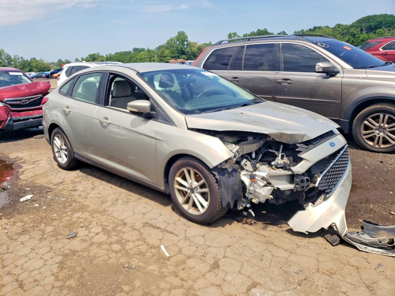 2015 Ford Focus Se Tan vin: 1FADP3F27FL377865