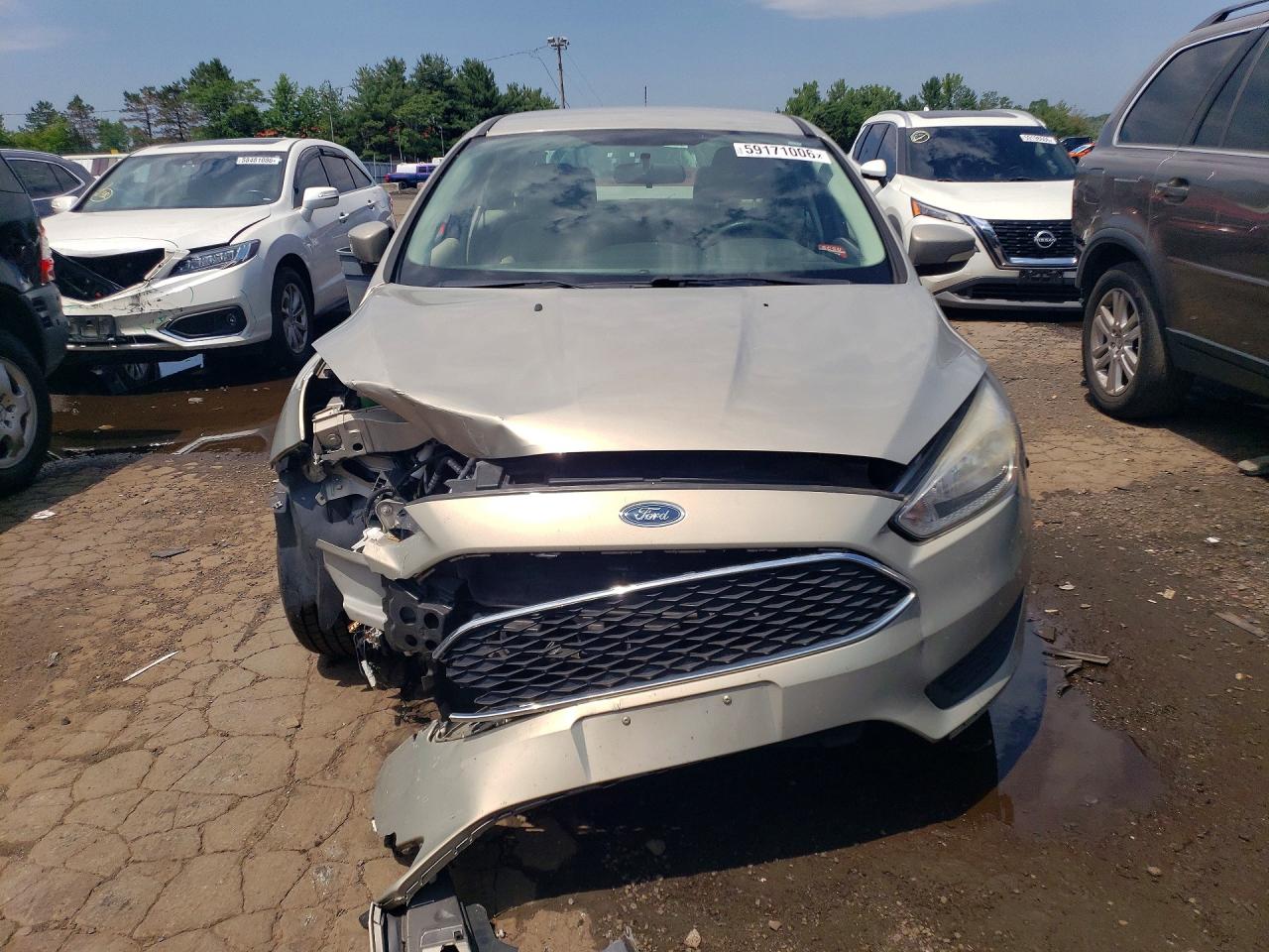 2015 Ford Focus Se Tan vin: 1FADP3F27FL377865