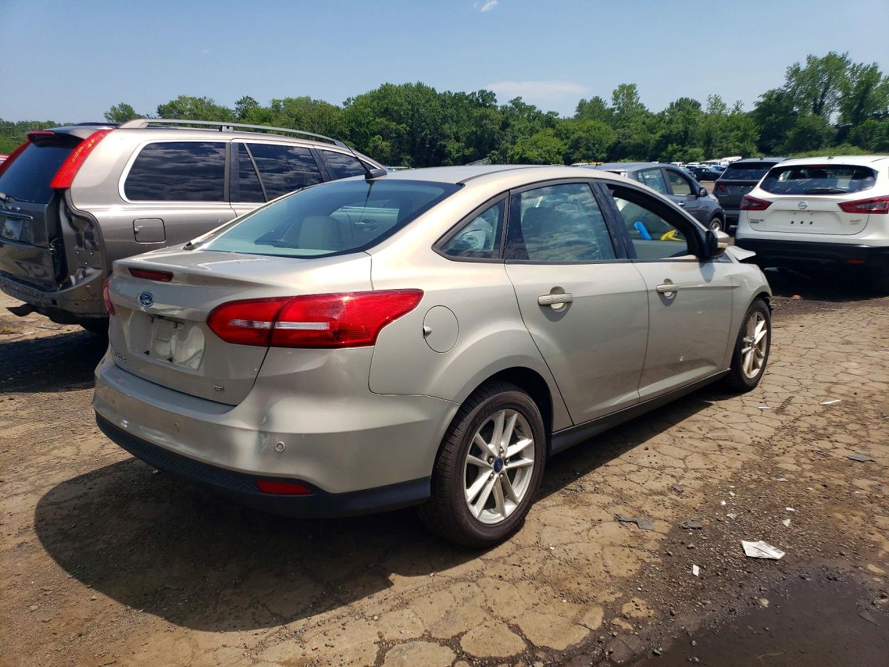 2015 Ford Focus Se Tan vin: 1FADP3F27FL377865