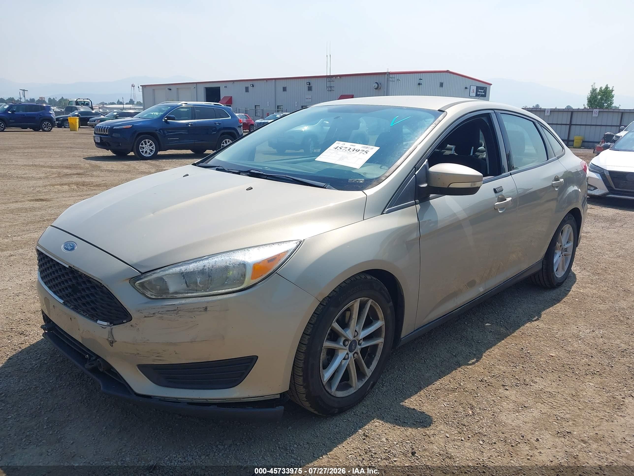 2015 Ford Focus Se Champagne vin: 1FADP3F28FL201388