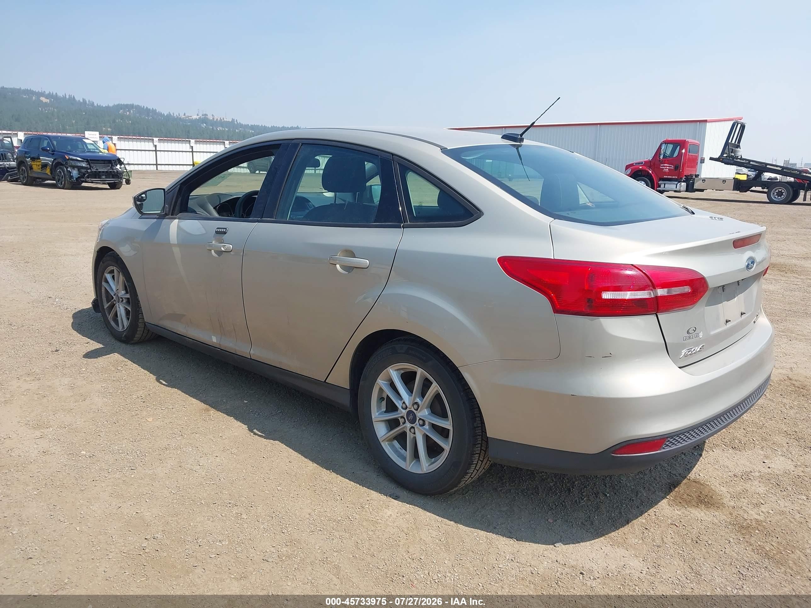 2015 Ford Focus Se Champagne vin: 1FADP3F28FL201388