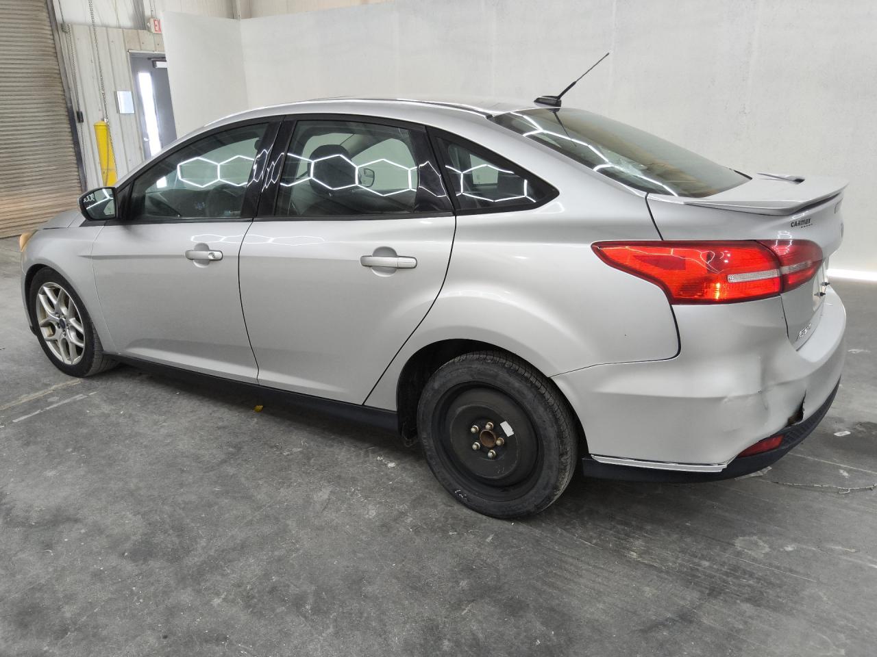 2015 Ford Focus Se Silver vin: 1FADP3F28FL318596 Damage: Left Rear Wheel, Mismatched, Replacement Required