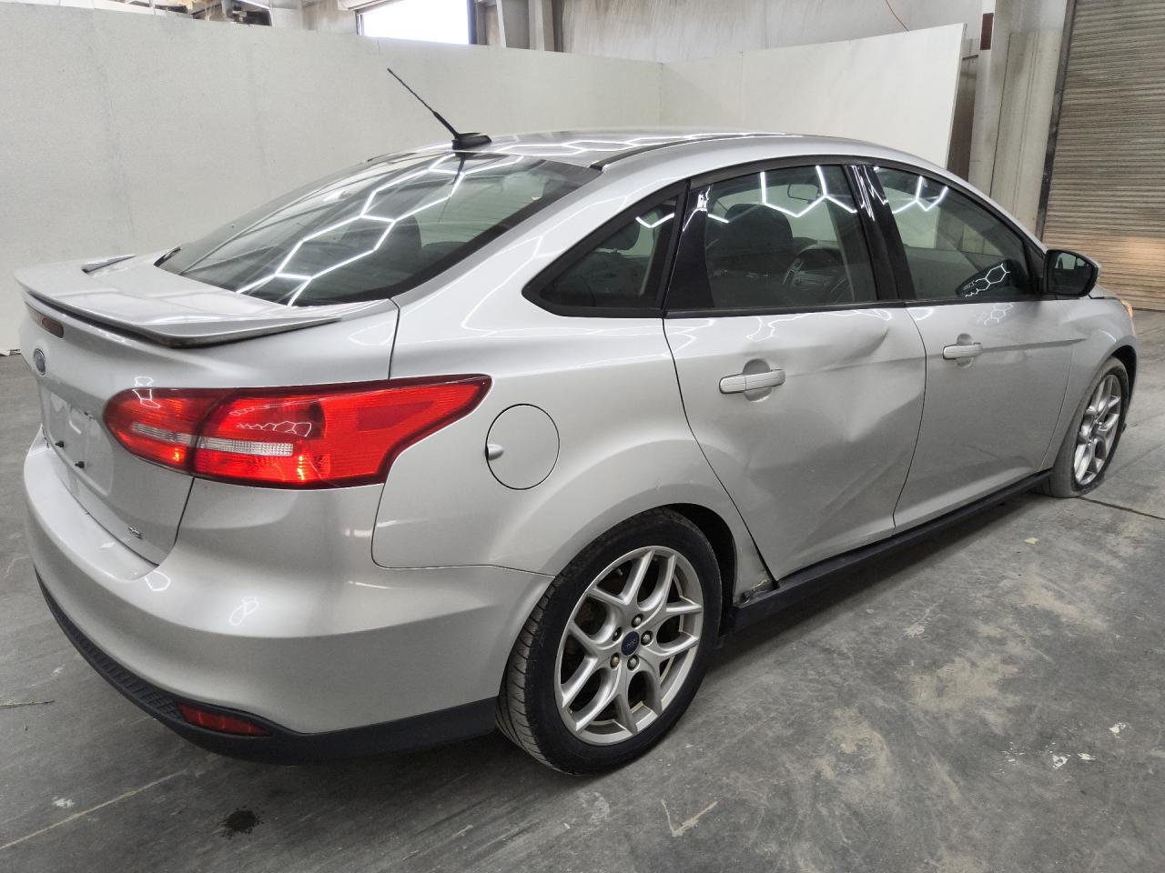 2015 Ford Focus Se Silver vin: 1FADP3F28FL318596 Damage: Right Qtr Panel, Dent(S) W/ Paint Dmg, 9 To 10 Inches