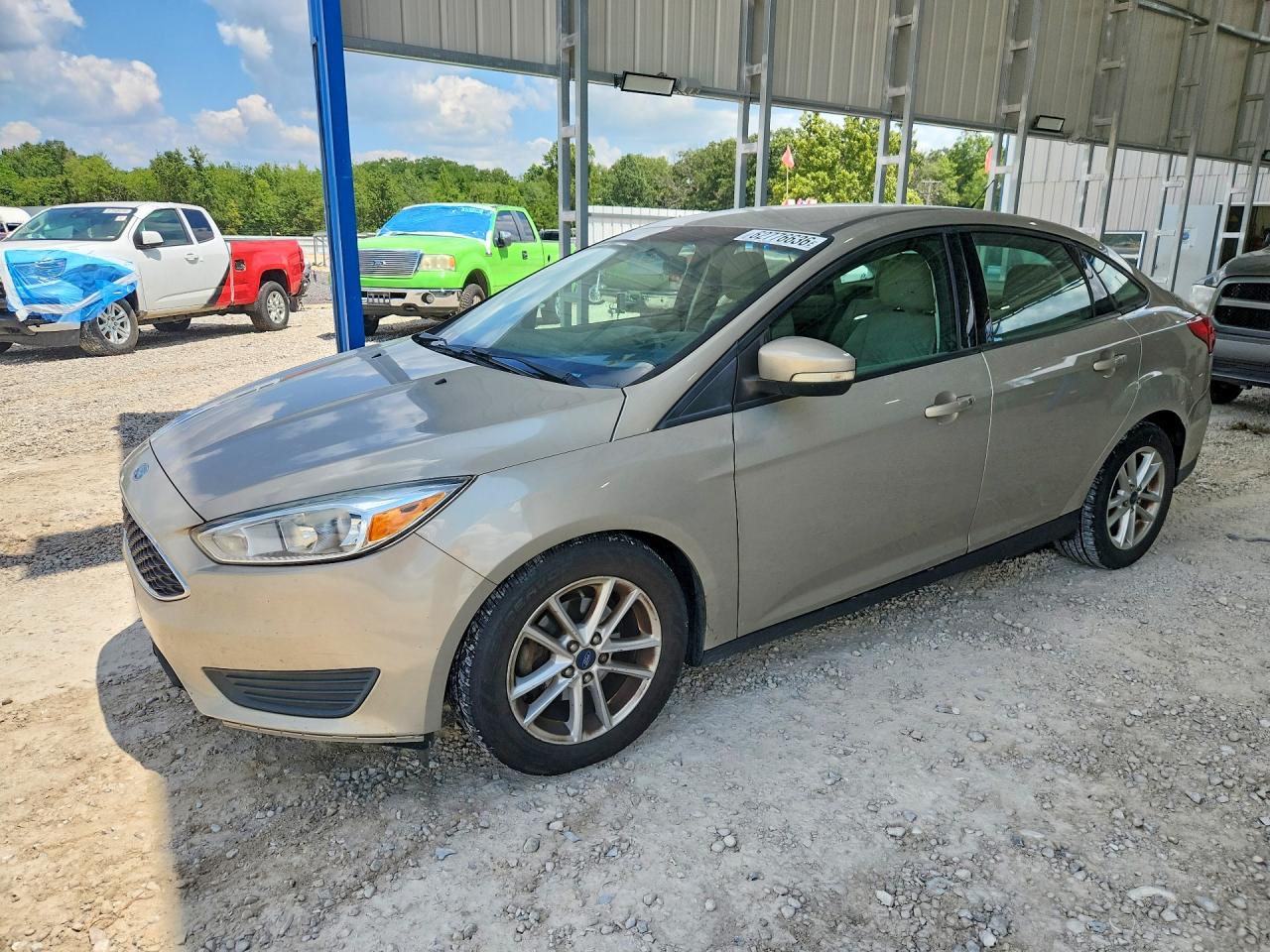 2015 Ford Focus Se Tan vin: 1FADP3F28FL357351
