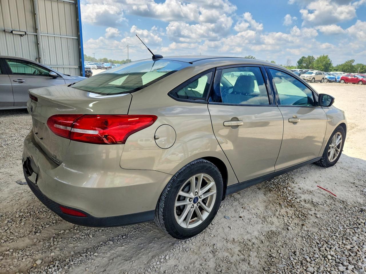 2015 Ford Focus Se Tan vin: 1FADP3F28FL357351