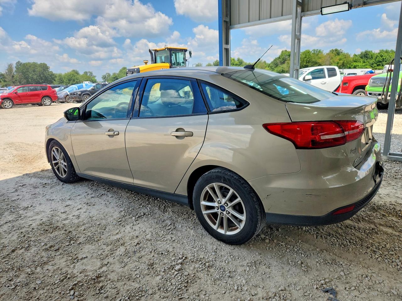 2015 Ford Focus Se Tan vin: 1FADP3F28FL357351