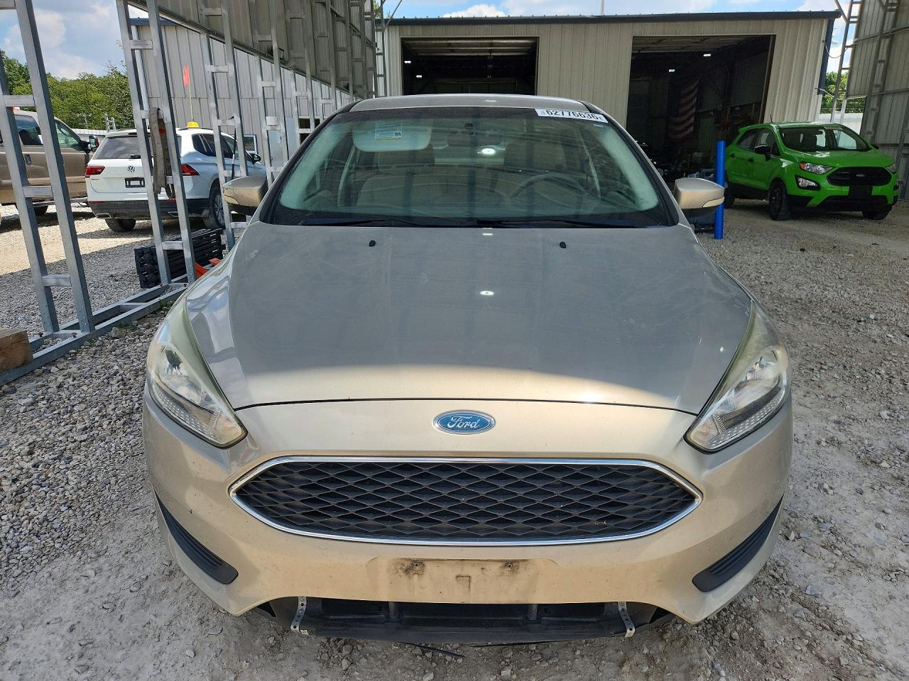2015 Ford Focus Se Tan vin: 1FADP3F28FL357351