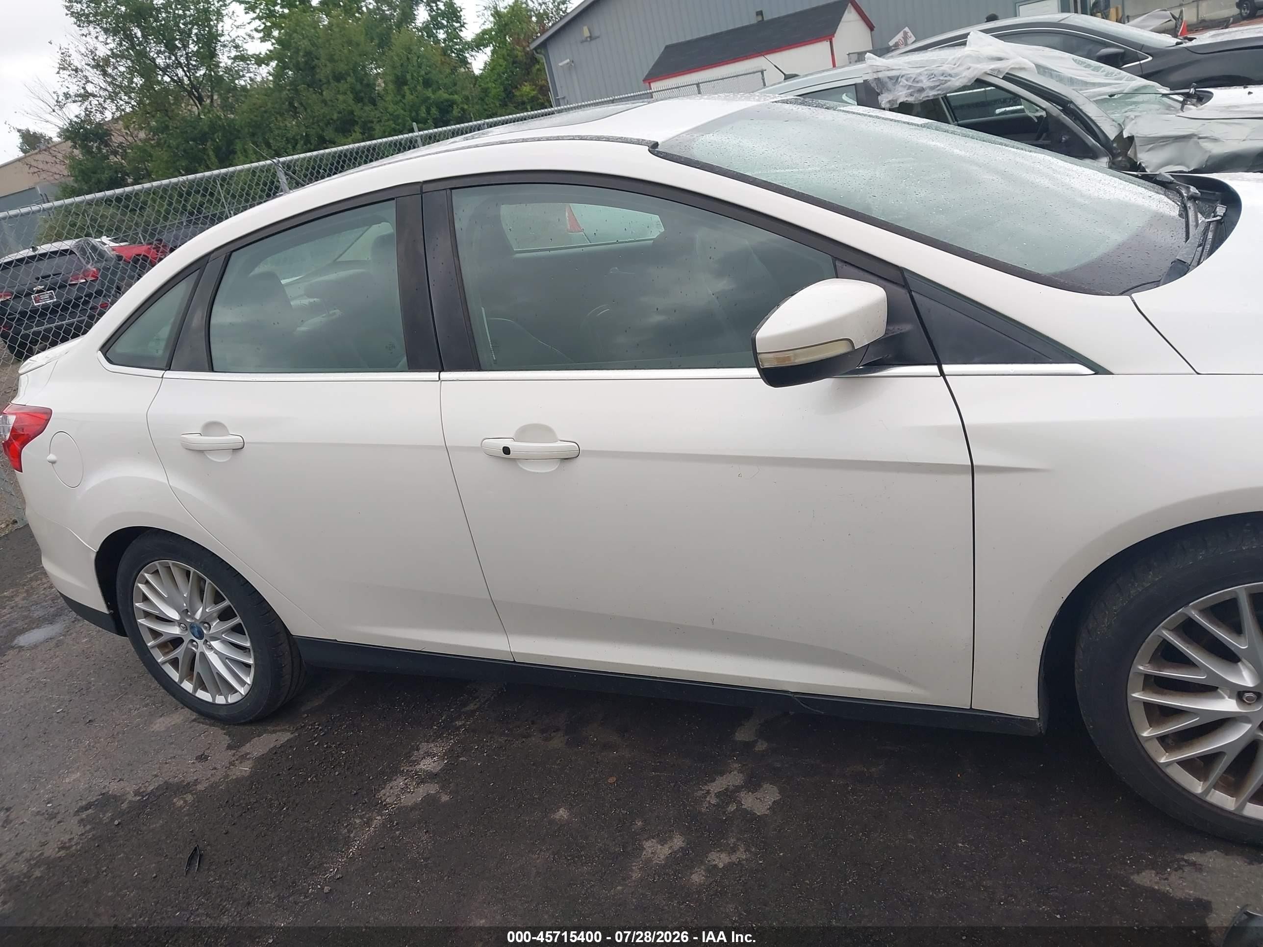 2013 Ford Focus Titanium White vin: 1FADP3J20DL113603