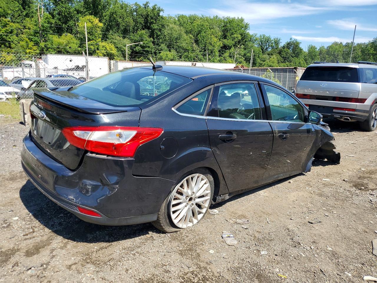 2014 Ford Focus Titanium Black vin: 1FADP3J20EL159983