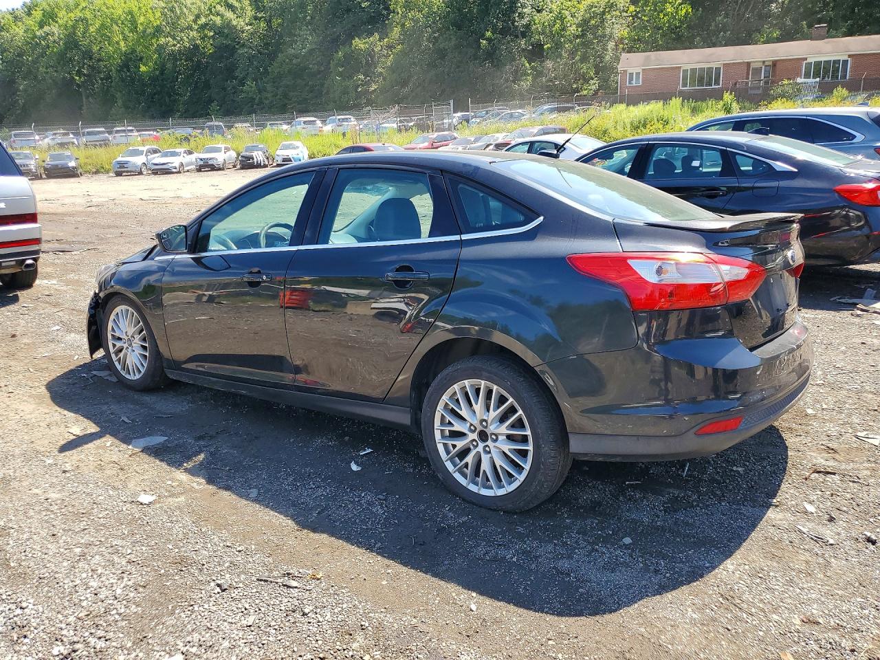 2014 Ford Focus Titanium Black vin: 1FADP3J20EL159983