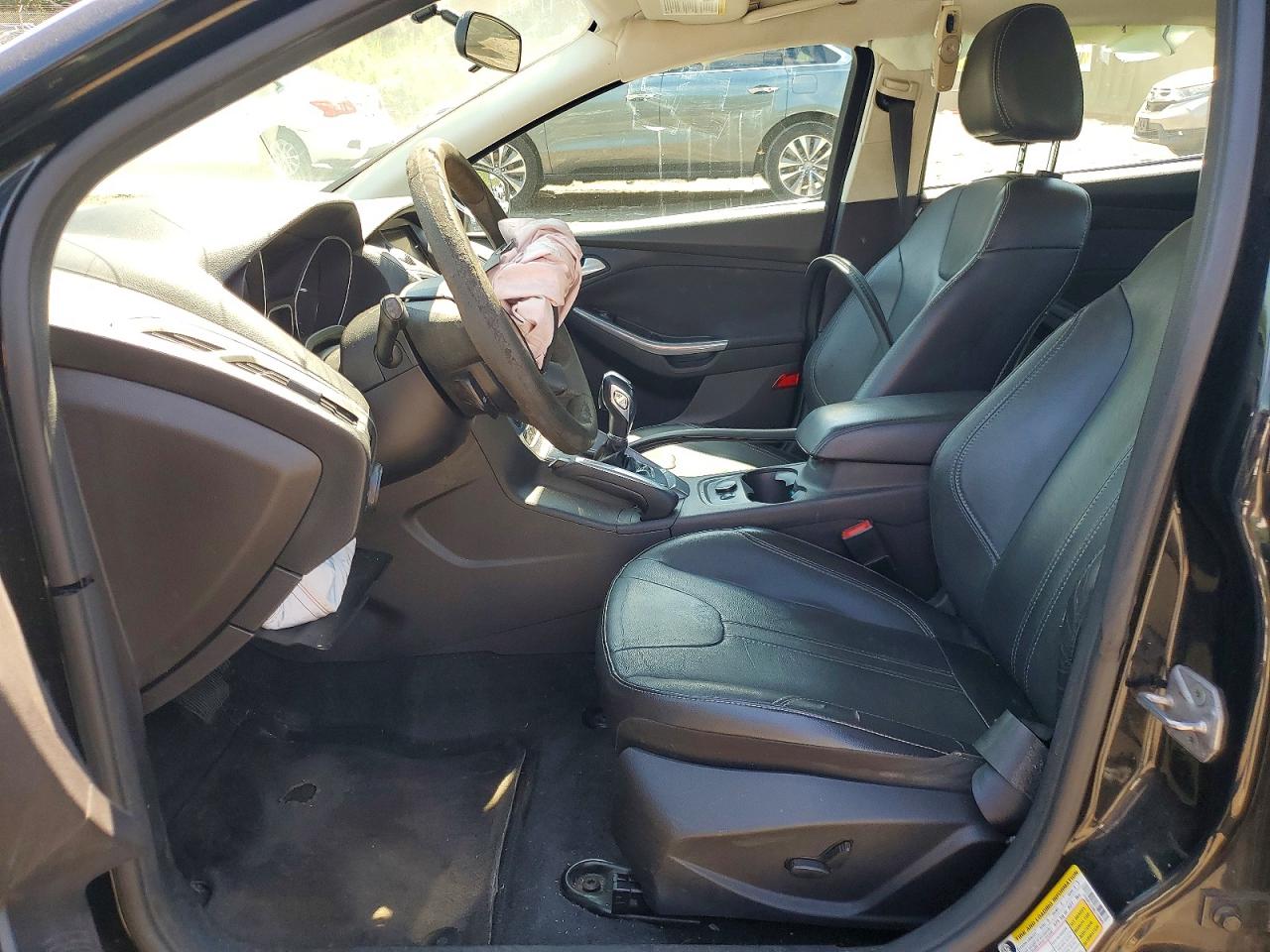 2014 Ford Focus Titanium Black vin: 1FADP3J20EL159983