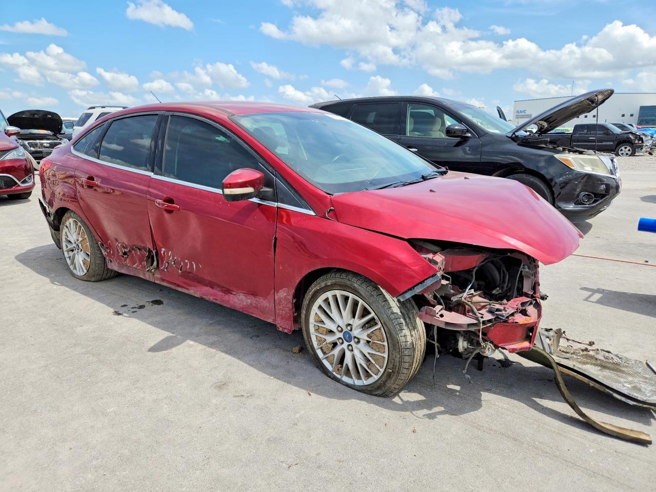 2014 Ford Focus Titanium Red vin: 1FADP3J20EL224220