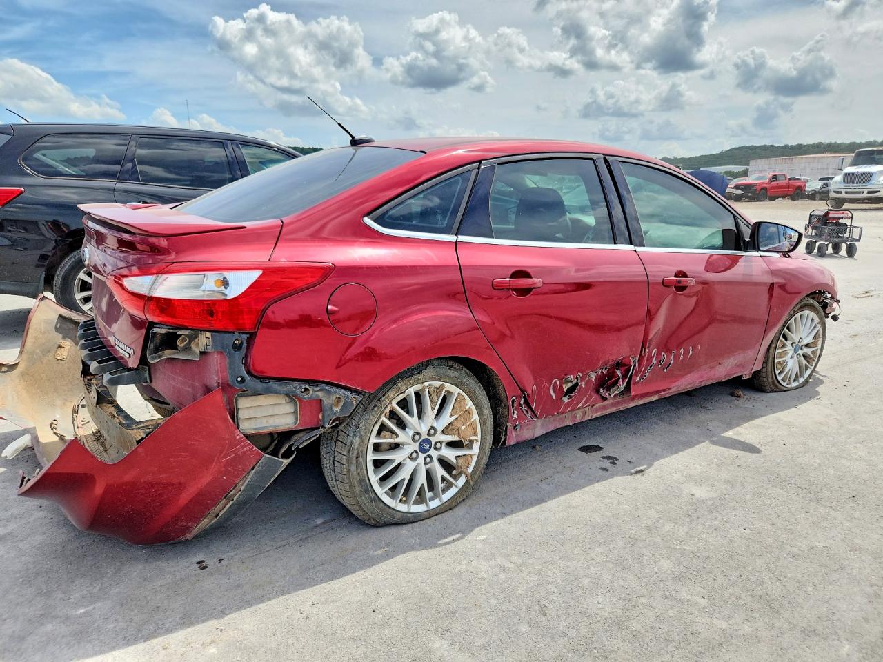 2014 Ford Focus Titanium Red vin: 1FADP3J20EL224220