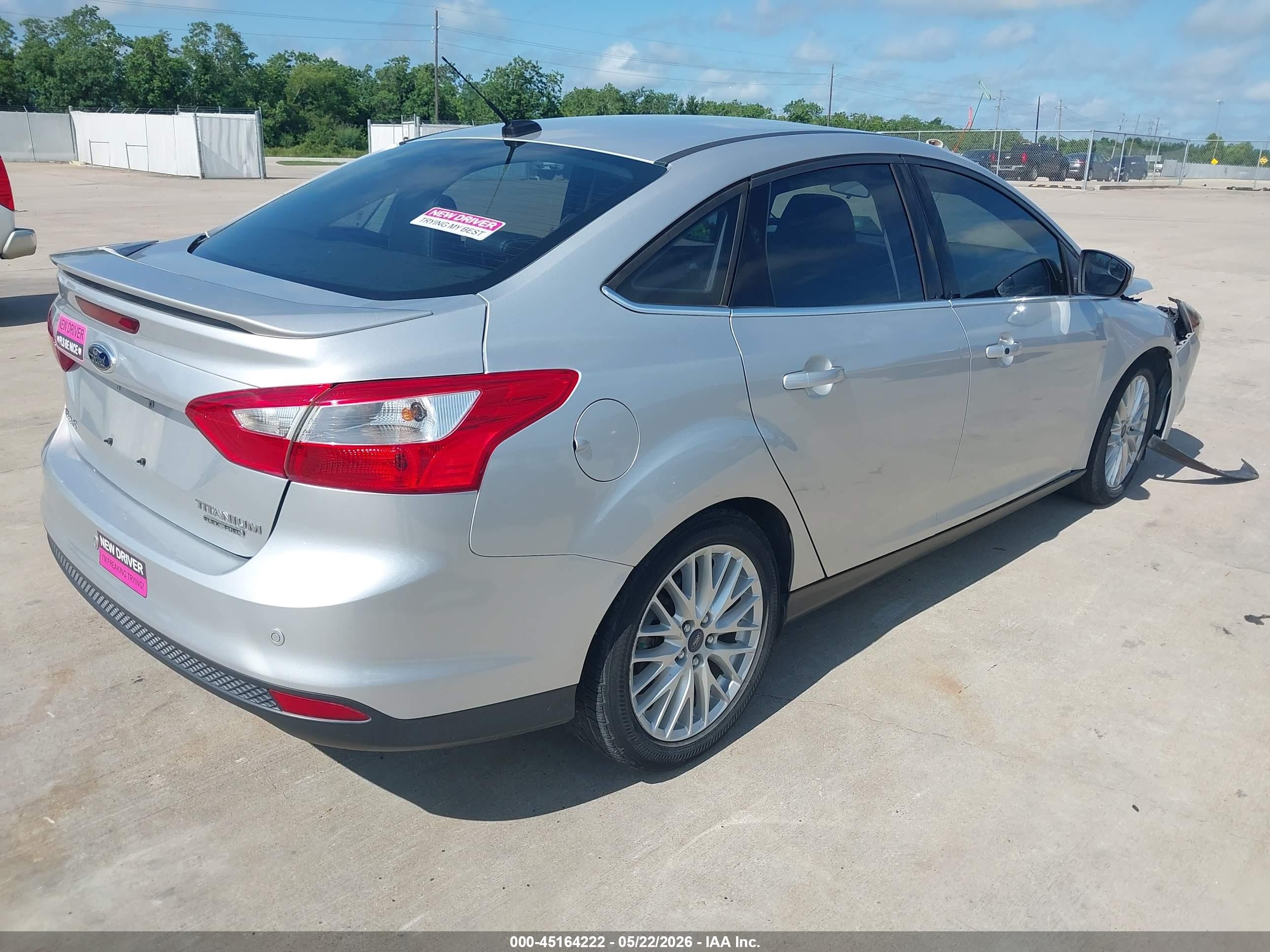 2014 Ford Focus Titanium Silver vin: 1FADP3J20EL310272