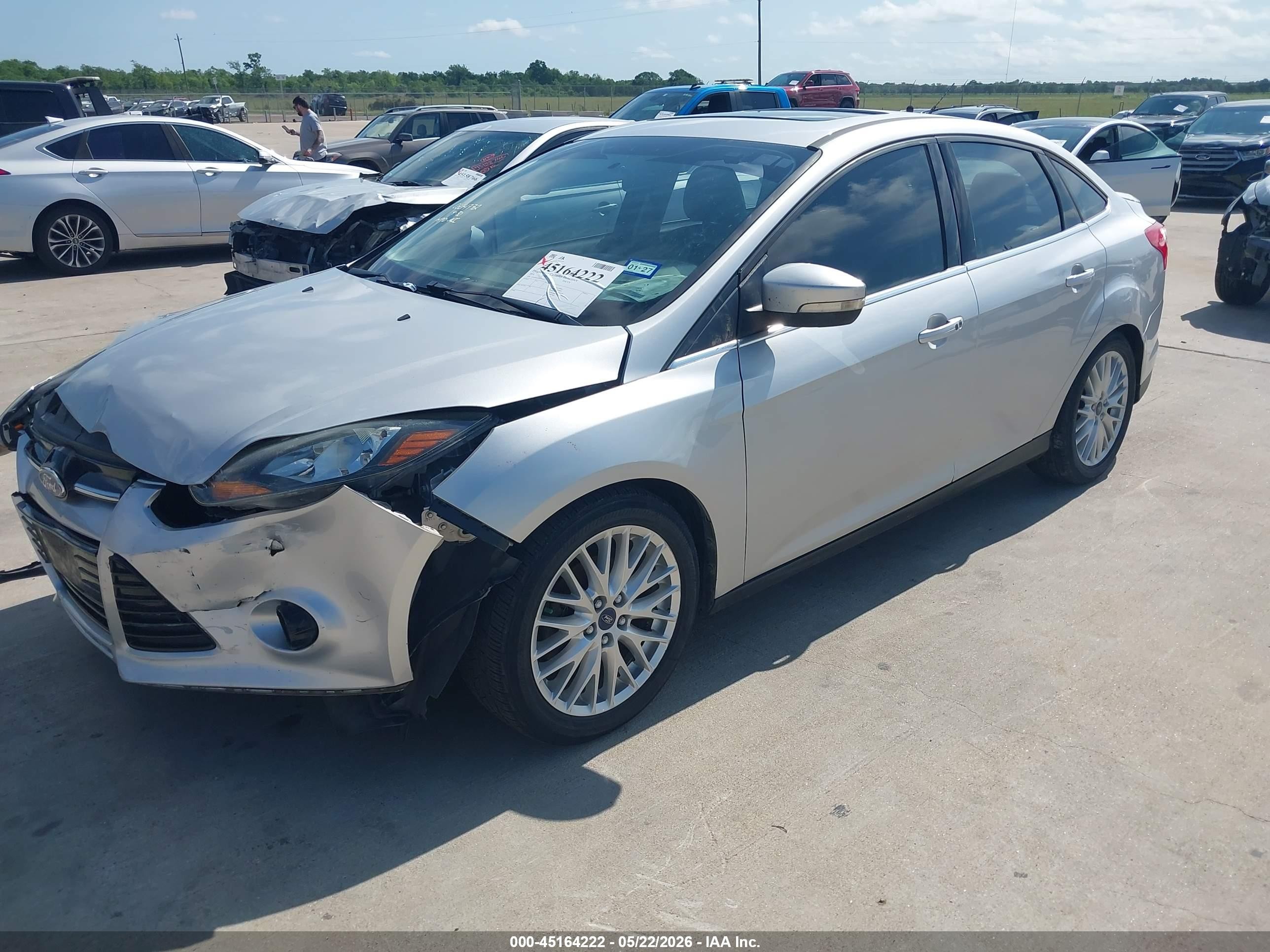 2014 Ford Focus Titanium Silver vin: 1FADP3J20EL310272