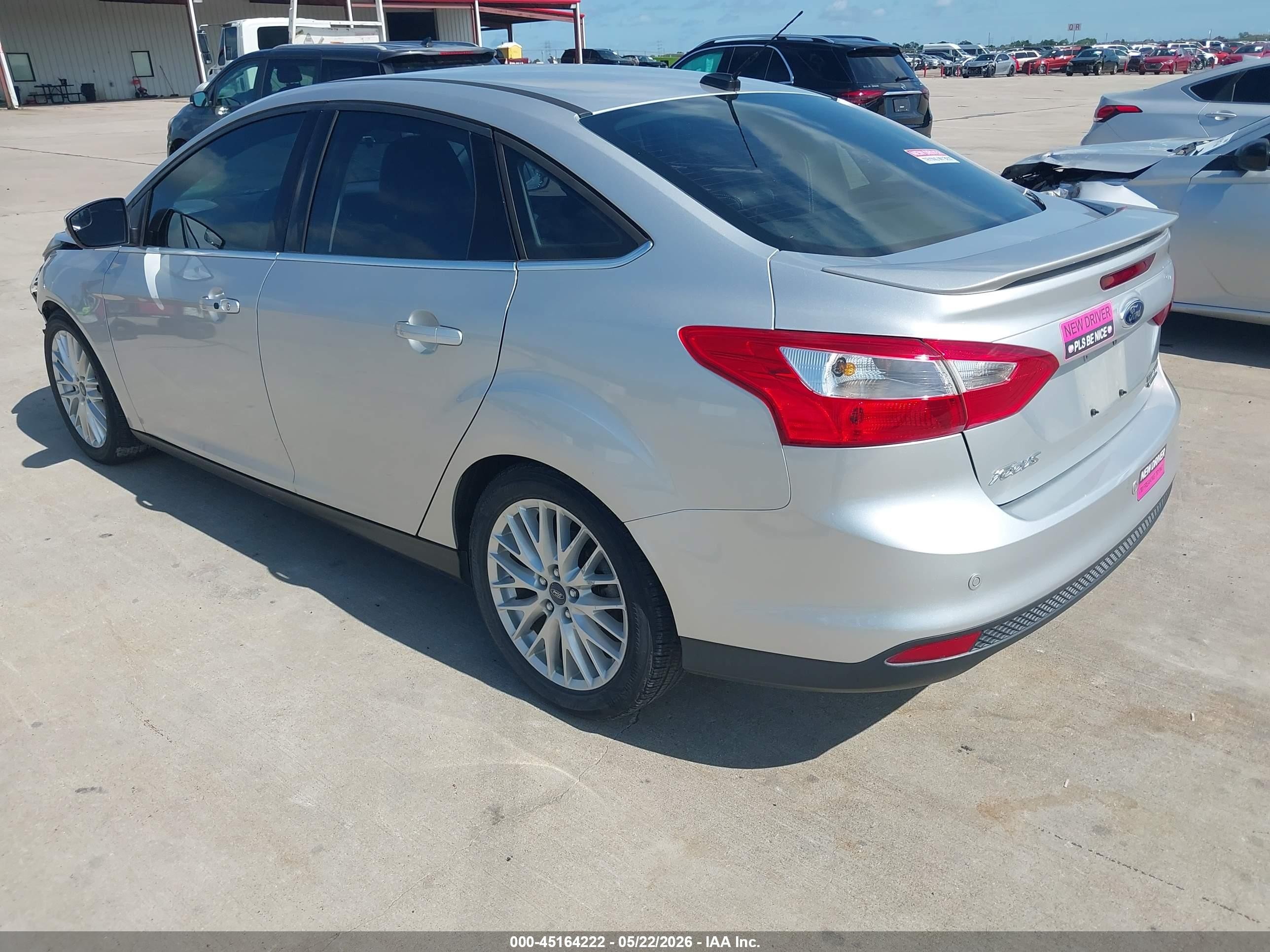 2014 Ford Focus Titanium Silver vin: 1FADP3J20EL310272